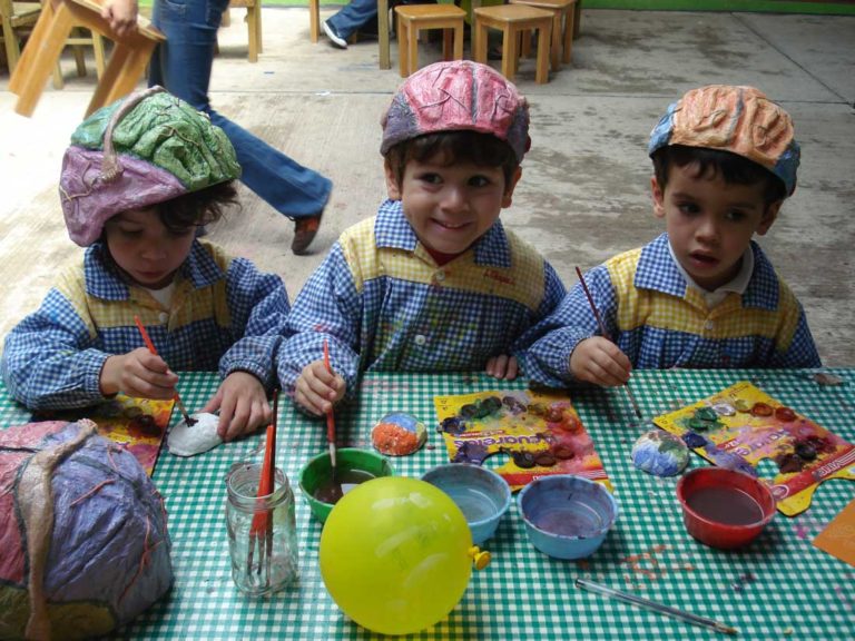 Photo of children wearing handmade brain hats
