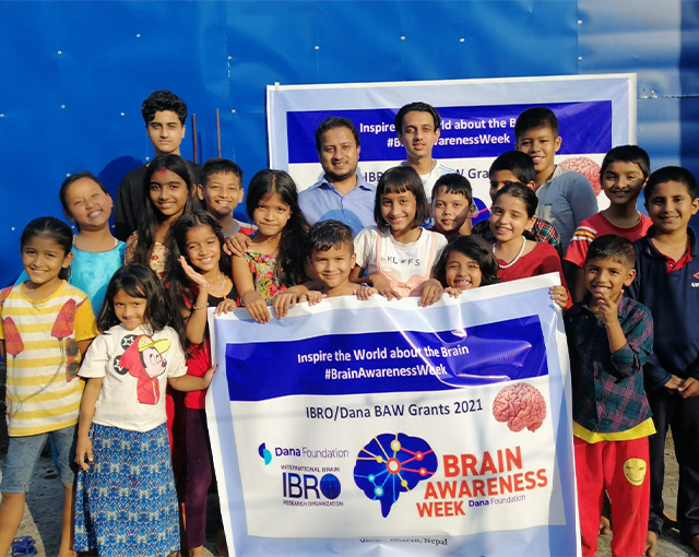 Group photo holding a sign celebrating Brain Awareness Week